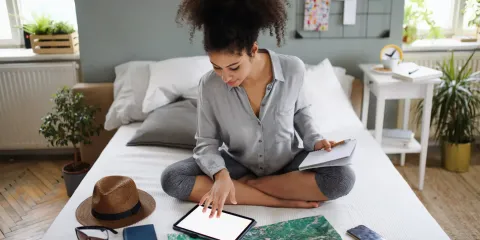A female planning for a trip.